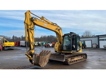 Rupsgraafmachine NEW HOLLAND