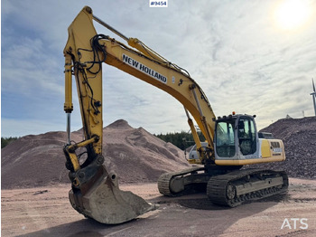 Rupsgraafmachine NEW HOLLAND