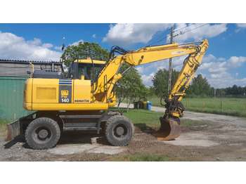 Mobiele graafmachine KOMATSU PW140