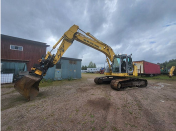 Rupsgraafmachine NEW HOLLAND