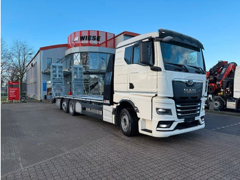 Vrachtwagen met open laadbak MAN