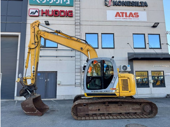 Rupsgraafmachine NEW HOLLAND