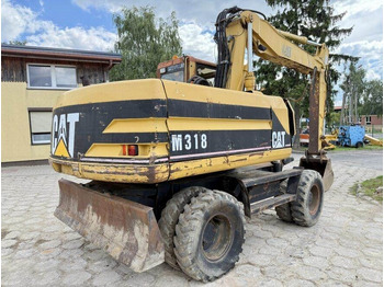 Mobiele graafmachine CATERPILLAR M318