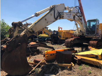 Rupsgraafmachine NEW HOLLAND E215B