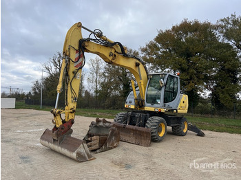 Mobiele graafmachine NEW HOLLAND MH CITY