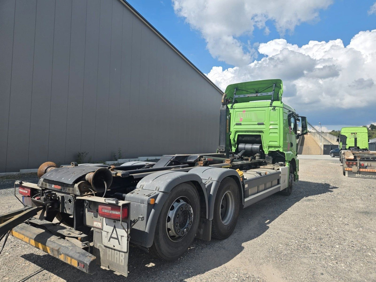 MAN TGS 2651 Abrollkipper HIAB Lift -Lenkachse - Haakarmsysteem vrachtwagen: afbeelding 3 MAN TGS 2651 Abrollkipper HIAB Lift -Lenkachse - Haakarmsysteem vrachtwagen: afbeelding 3