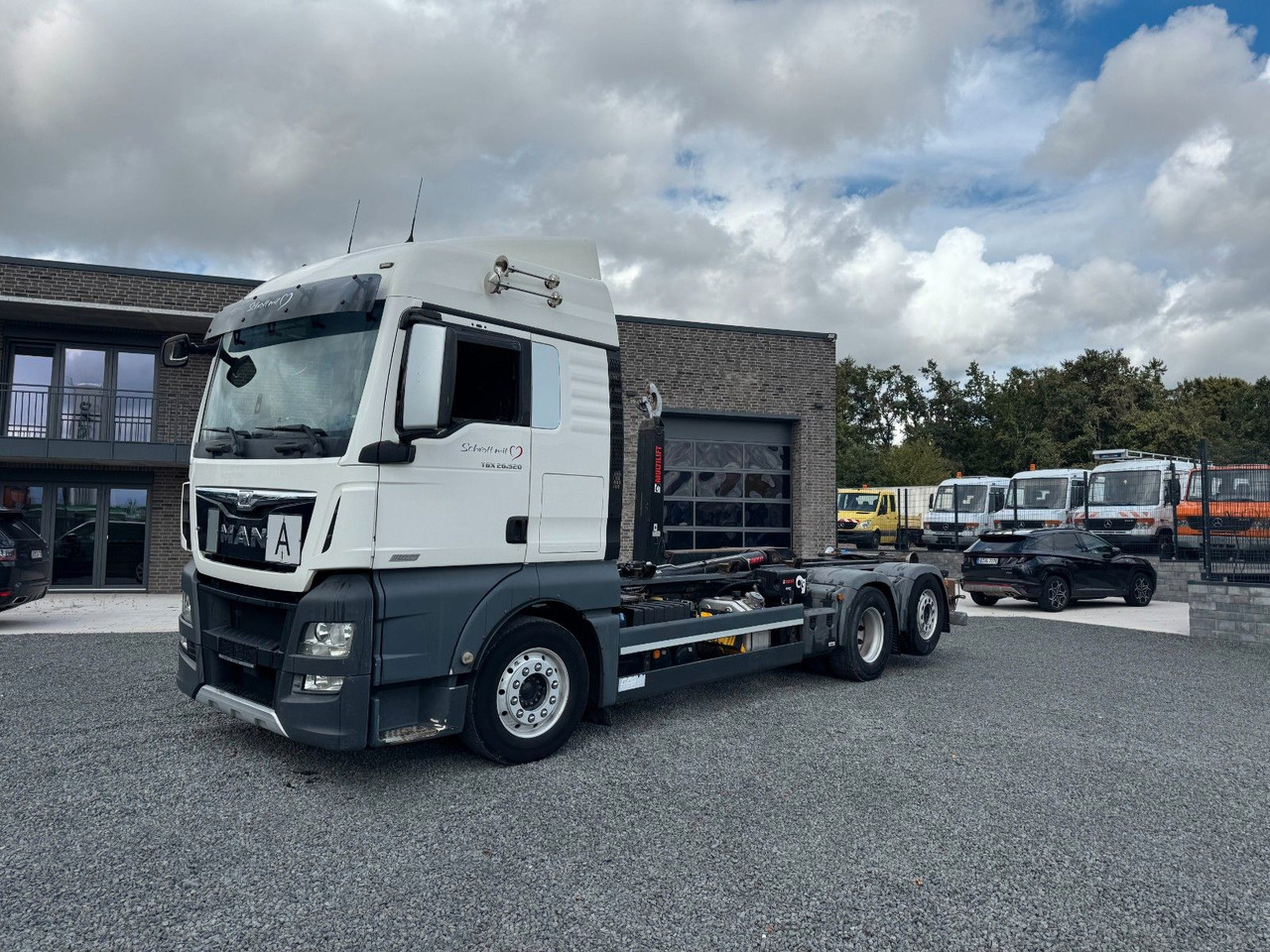 MAN TGX 26.520 D38 Abrollkipper Multilift - Haakarmsysteem vrachtwagen: afbeelding 2 MAN TGX 26.520 D38 Abrollkipper Multilift - Haakarmsysteem vrachtwagen: afbeelding 2