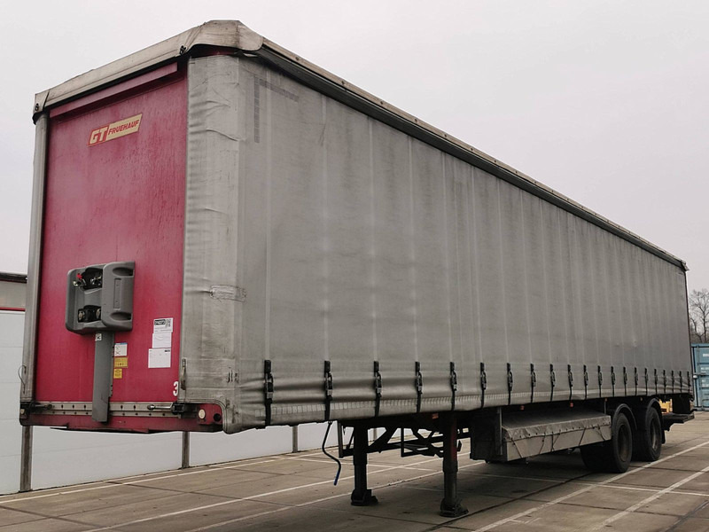 Fruehauf ONCRK 32 220A - Schuifzeiloplegger: afbeelding 1 Fruehauf ONCRK 32 220A - Schuifzeiloplegger: afbeelding 1