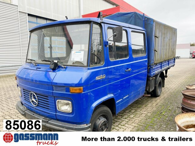 Mercedes-Benz L 407 D 4x2 Doka, Ex-THW - Vrachtwagen met open laadbak: afbeelding 1 Mercedes-Benz L 407 D 4x2 Doka, Ex-THW - Vrachtwagen met open laadbak: afbeelding 1