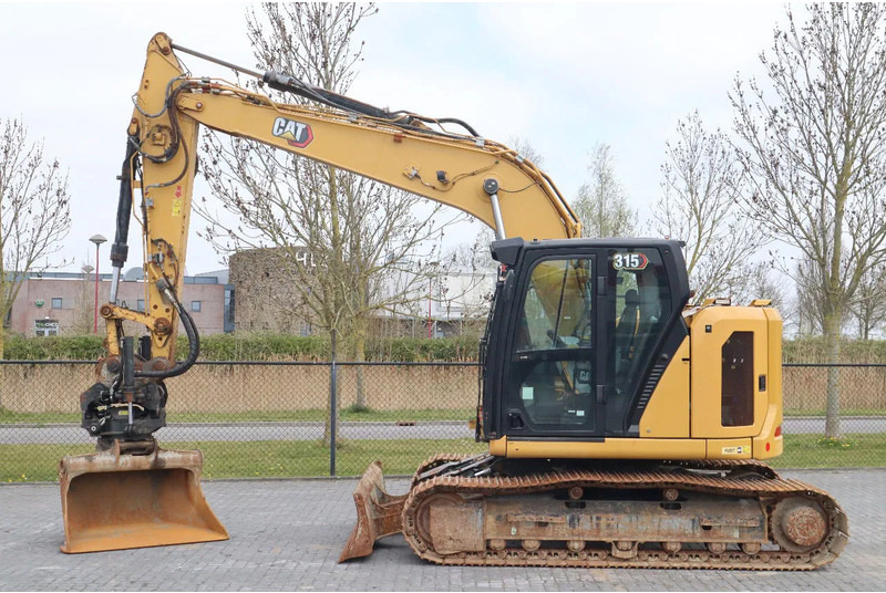 Caterpillar 315 07B | ROTOTILT | BUCKET | DOZERBLADE - Rupsgraafmachine: afbeelding 1 Caterpillar 315 07B | ROTOTILT | BUCKET | DOZERBLADE - Rupsgraafmachine: afbeelding 1
