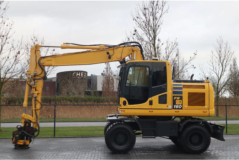Komatsu PW 160-10 | ROTOTILT | NEW TIRES - Mobiele graafmachine: afbeelding 1 Komatsu PW 160-10 | ROTOTILT | NEW TIRES - Mobiele graafmachine: afbeelding 1