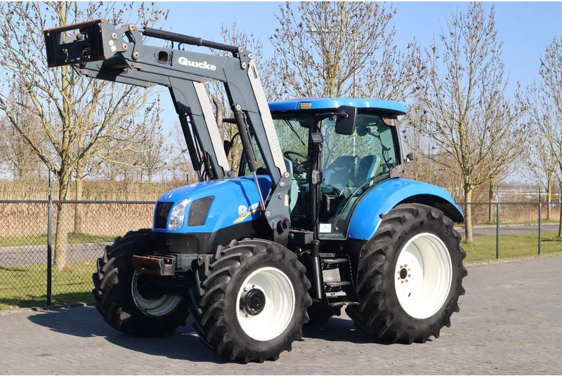 New Holland T6040 | FRONT LOADER | 50KM/H | QUICK COUPLER - Tractor: afbeelding 1 New Holland T6040 | FRONT LOADER | 50KM/H | QUICK COUPLER - Tractor: afbeelding 1