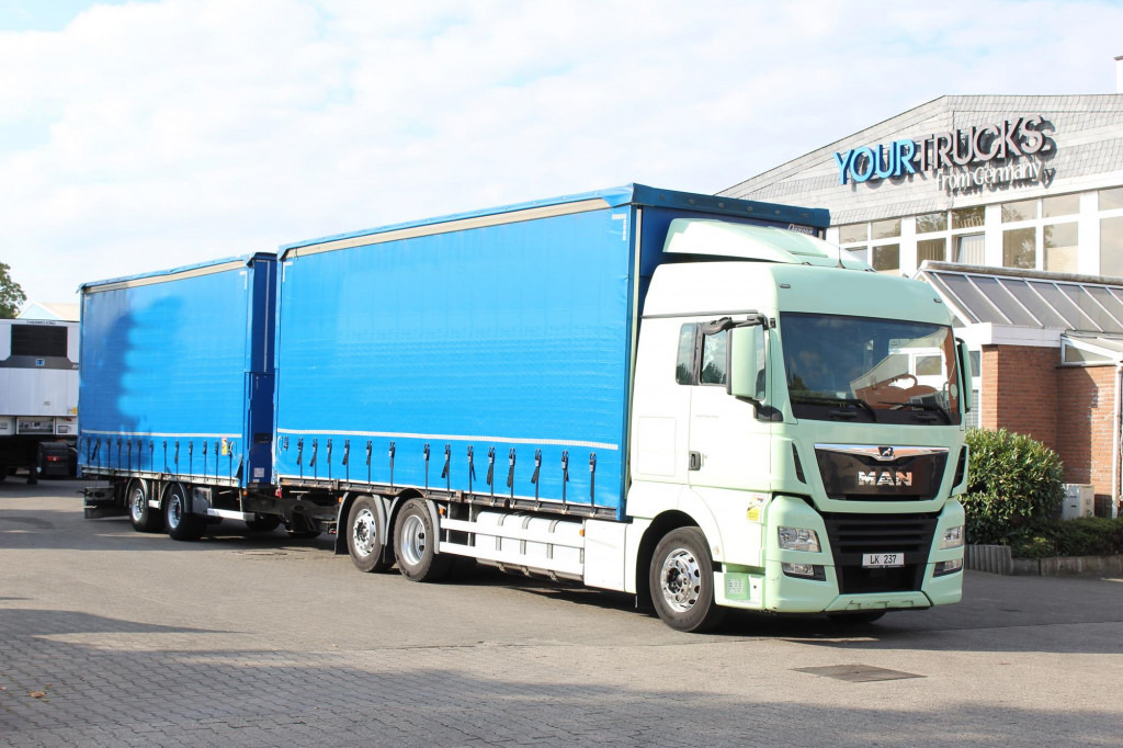 MAN TGX 26.460 Retarder Plane-Zug 120M3 Durchlade - Schuifzeilen vrachtwagen: afbeelding 1 MAN TGX 26.460 Retarder Plane-Zug 120M3 Durchlade - Schuifzeilen vrachtwagen: afbeelding 1
