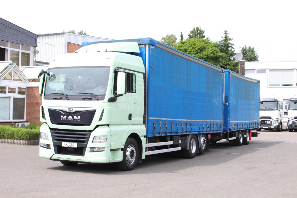 MAN TGX26.460 Durchlad Plane-Jumbo Retarder Hubdach - Schuifzeilen vrachtwagen: afbeelding 1 MAN TGX26.460 Durchlad Plane-Jumbo Retarder Hubdach - Schuifzeilen vrachtwagen: afbeelding 1