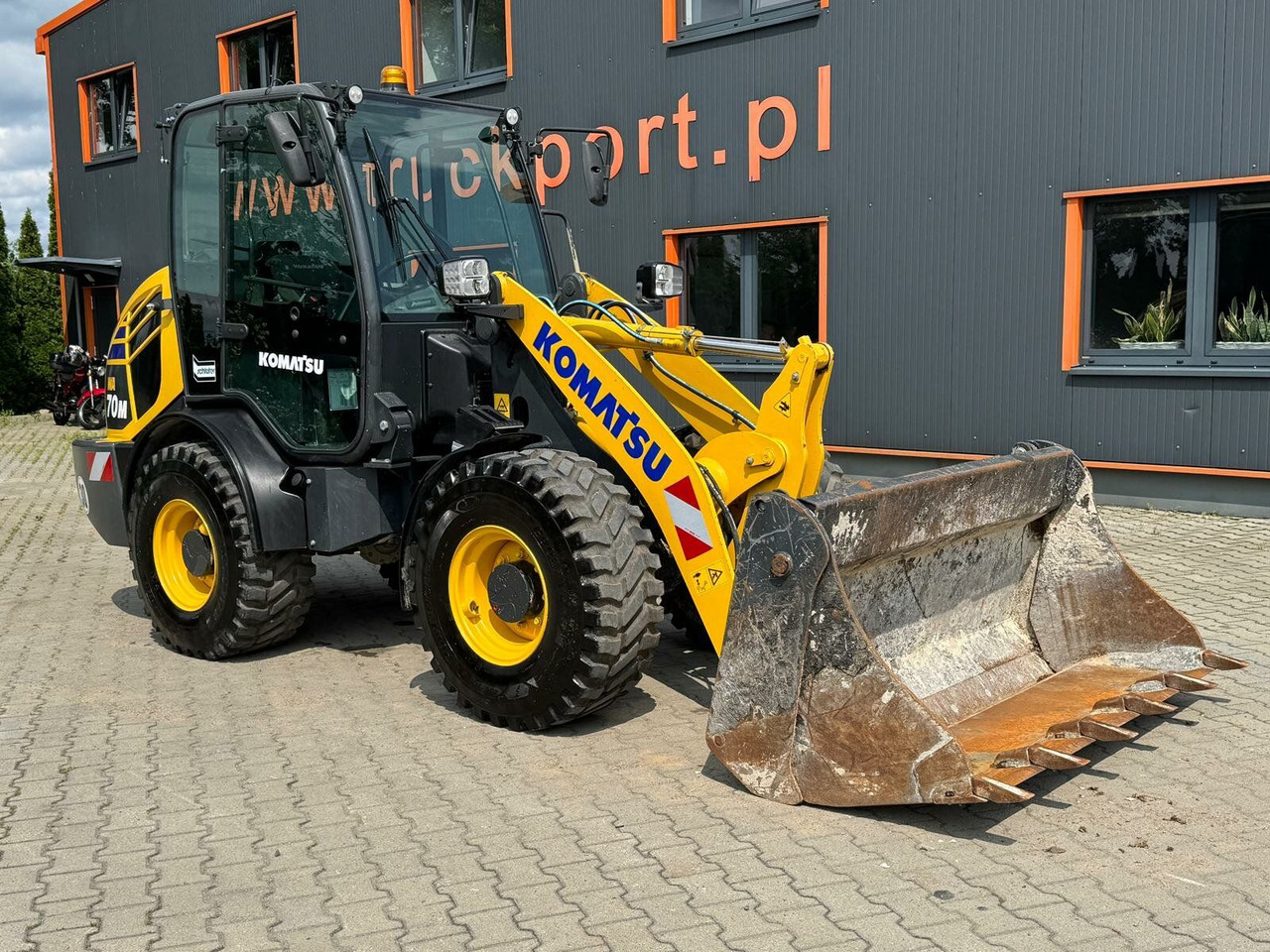 Komatsu WA 70M-8E0 Radlader 6 Ton - 731 H - 0,75m³ - Wiellader: afbeelding 1 Komatsu WA 70M-8E0 Radlader 6 Ton - 731 H - 0,75m³ - Wiellader: afbeelding 1