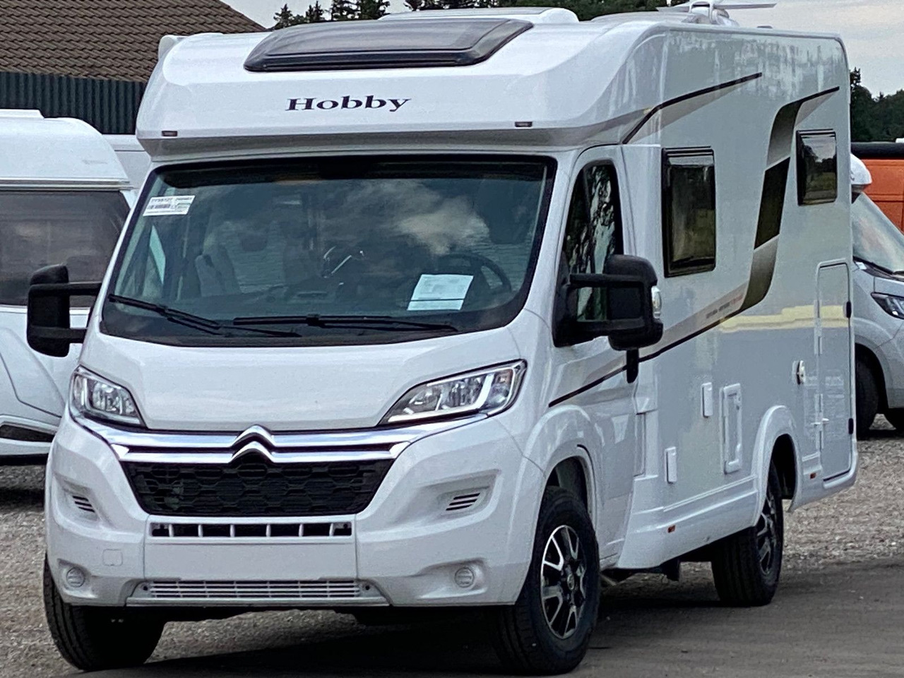 Hobby Optima Ontour Edition V65 GE Navi Markise SAT - Half integraal camper: afbeelding 1 Hobby Optima Ontour Edition V65 GE Navi Markise SAT - Half integraal camper: afbeelding 1