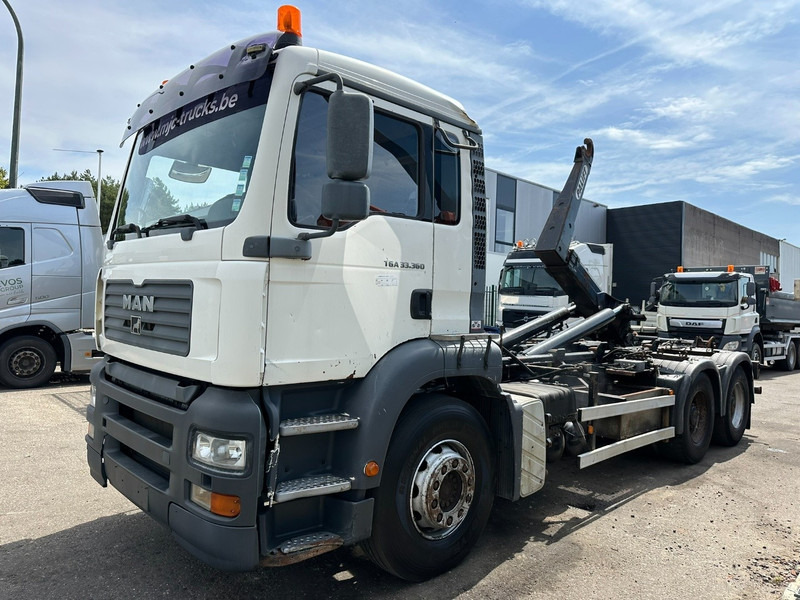MAN TGA 33.360 6x4 HOOKLIFT - MANUAL ZF - BIG AXLES HUB REDUCTION / STEEL SPRING - BE TRUCK - Haakarmsysteem vrachtwagen: afbeelding 3 MAN TGA 33.360 6x4 HOOKLIFT - MANUAL ZF - BIG AXLES HUB REDUCTION / STEEL SPRING - BE TRUCK - Haakarmsysteem vrachtwagen: afbeelding 3