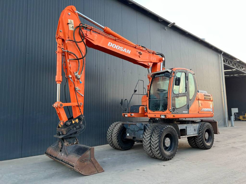 Doosan DX170W - Mobiele graafmachine: afbeelding 1 Doosan DX170W - Mobiele graafmachine: afbeelding 1