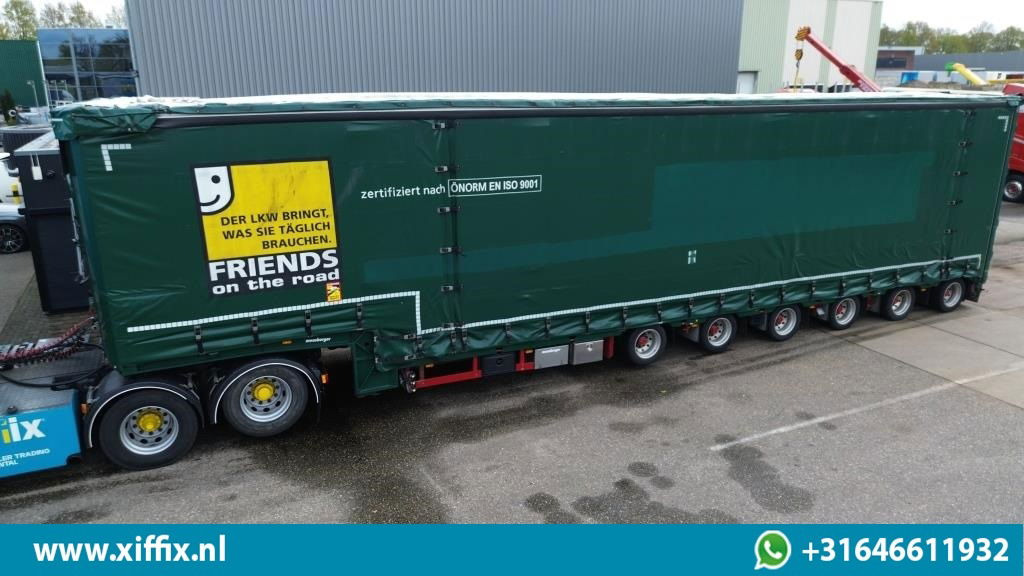 Meusburger 6-ass. Semi dieplader met elektrische huifopbouw / 3x naloop gestuurd - Dieplader oplegger: afbeelding 1 Meusburger 6-ass. Semi dieplader met elektrische huifopbouw / 3x naloop gestuurd - Dieplader oplegger: afbeelding 1