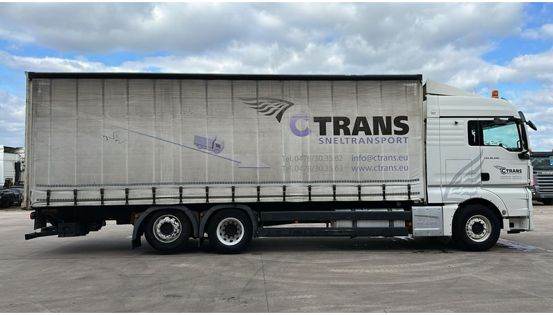 MAN TGX 26.400 (EURO 6 / 6X2 / LIFT / HAYON / BELGIAN TRUCK / GUTE ZUSTAND !! / 8.40 BOX LENGTH) - Schuifzeilen vrachtwagen: afbeelding 4 MAN TGX 26.400 (EURO 6 / 6X2 / LIFT / HAYON / BELGIAN TRUCK / GUTE ZUSTAND !! / 8.40 BOX LENGTH) - Schuifzeilen vrachtwagen: afbeelding 4