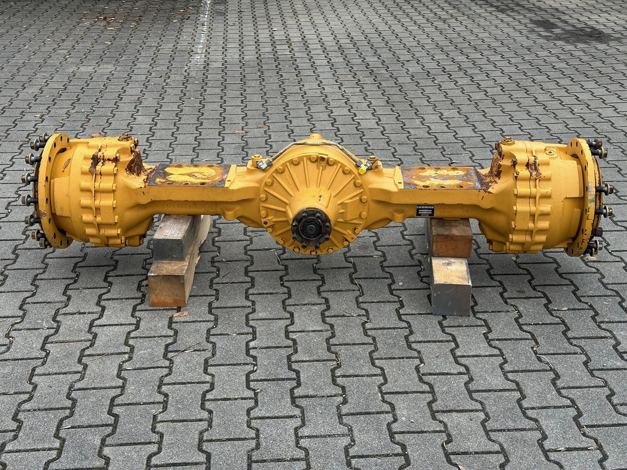 LIEBHERR Original Hinterachse-Planetenstarrachse Typ:MT-L3085. ID-Nr.10022957 – ID-Nr.10425800. L544-443, L544-445, L550-456, L554-453, L556-454. #10425800.1789310# - Achterass voor Wiellader: afbeelding 1 LIEBHERR Original Hinterachse-Planetenstarrachse Typ:MT-L3085. ID-Nr.10022957 – ID-Nr.10425800. L544-443, L544-445, L550-456, L554-453, L556-454. #10425800.1789310# - Achterass voor Wiellader: afbeelding 1