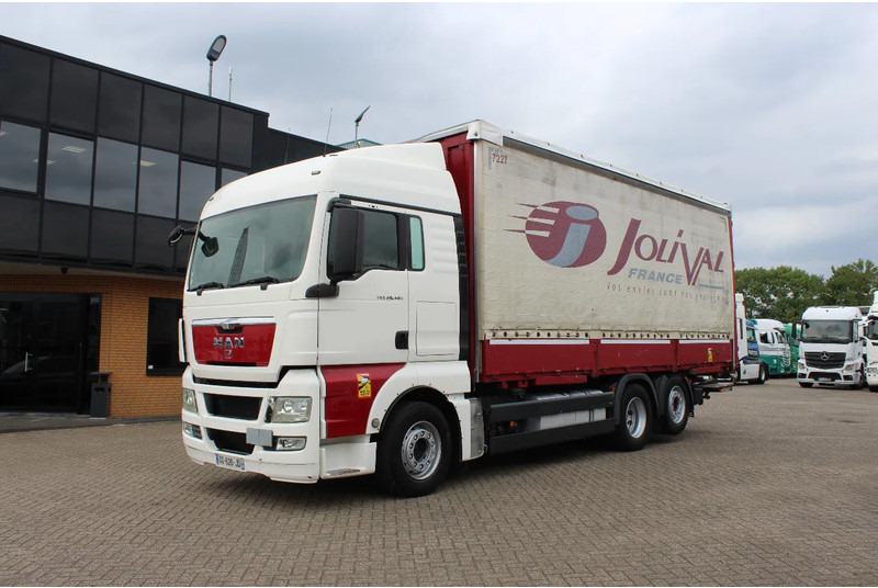 MAN TGX 26.440 * EURO5 * 6X2 * LIFT AXLE * - Schuifzeilen vrachtwagen: afbeelding 1 MAN TGX 26.440 * EURO5 * 6X2 * LIFT AXLE * - Schuifzeilen vrachtwagen: afbeelding 1
