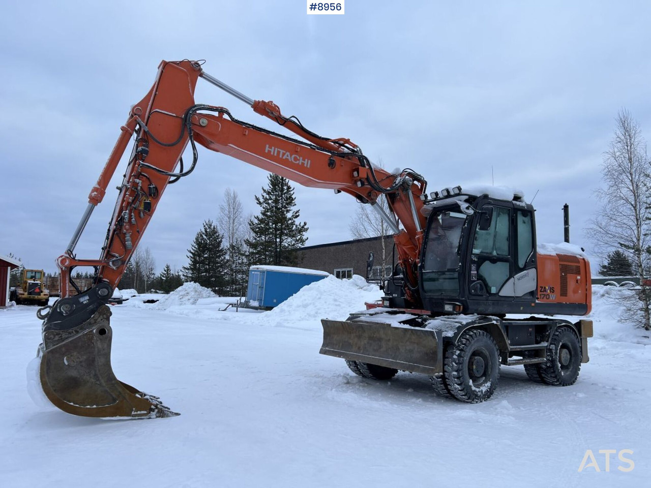 Hitachi ZX 170 W Wheeled excavator with tipper wagon and attachments - Mobiele graafmachine: afbeelding 1 Hitachi ZX 170 W Wheeled excavator with tipper wagon and attachments - Mobiele graafmachine: afbeelding 1