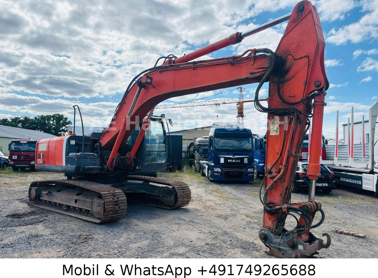 Hitachi ZX250LCN-3 *16.800 STD/Monoausleger/OilQuick - Rupsgraafmachine: afbeelding 1 Hitachi ZX250LCN-3 *16.800 STD/Monoausleger/OilQuick - Rupsgraafmachine: afbeelding 1