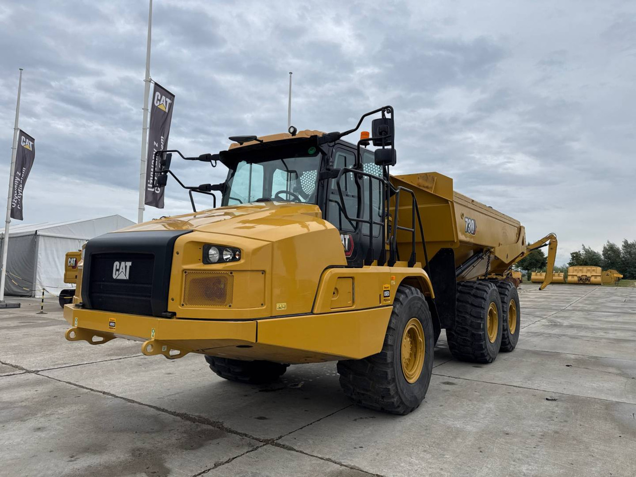 CAT 730 - Kiepwagen met knikbesturing: afbeelding 1 CAT 730 - Kiepwagen met knikbesturing: afbeelding 1