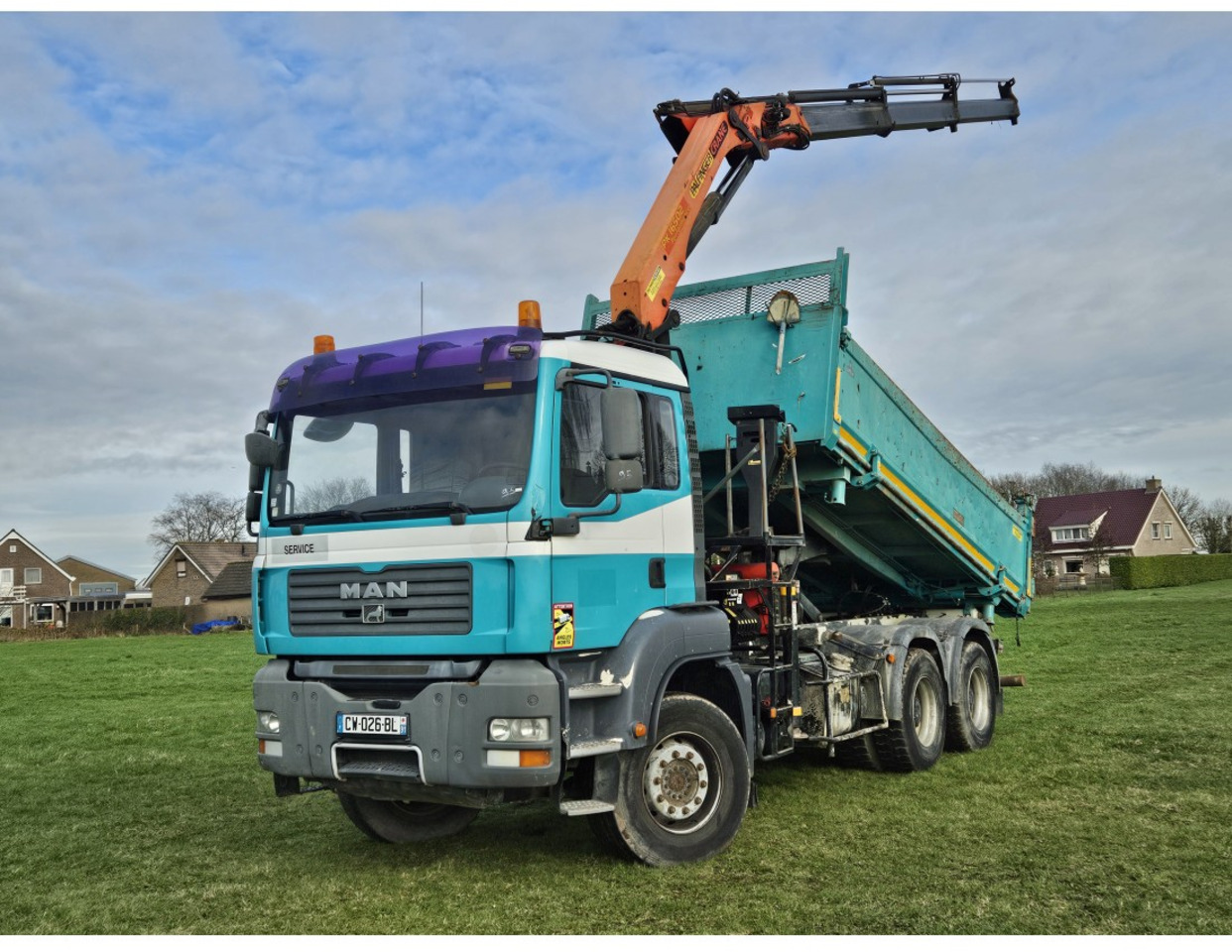 MAN TGA 33.360 TIPPER 3 SIDE CRANE PALFINGER 16502 *REMOTE CONTROL - Kipper vrachtwagen: afbeelding 1 MAN TGA 33.360 TIPPER 3 SIDE CRANE PALFINGER 16502 *REMOTE CONTROL - Kipper vrachtwagen: afbeelding 1