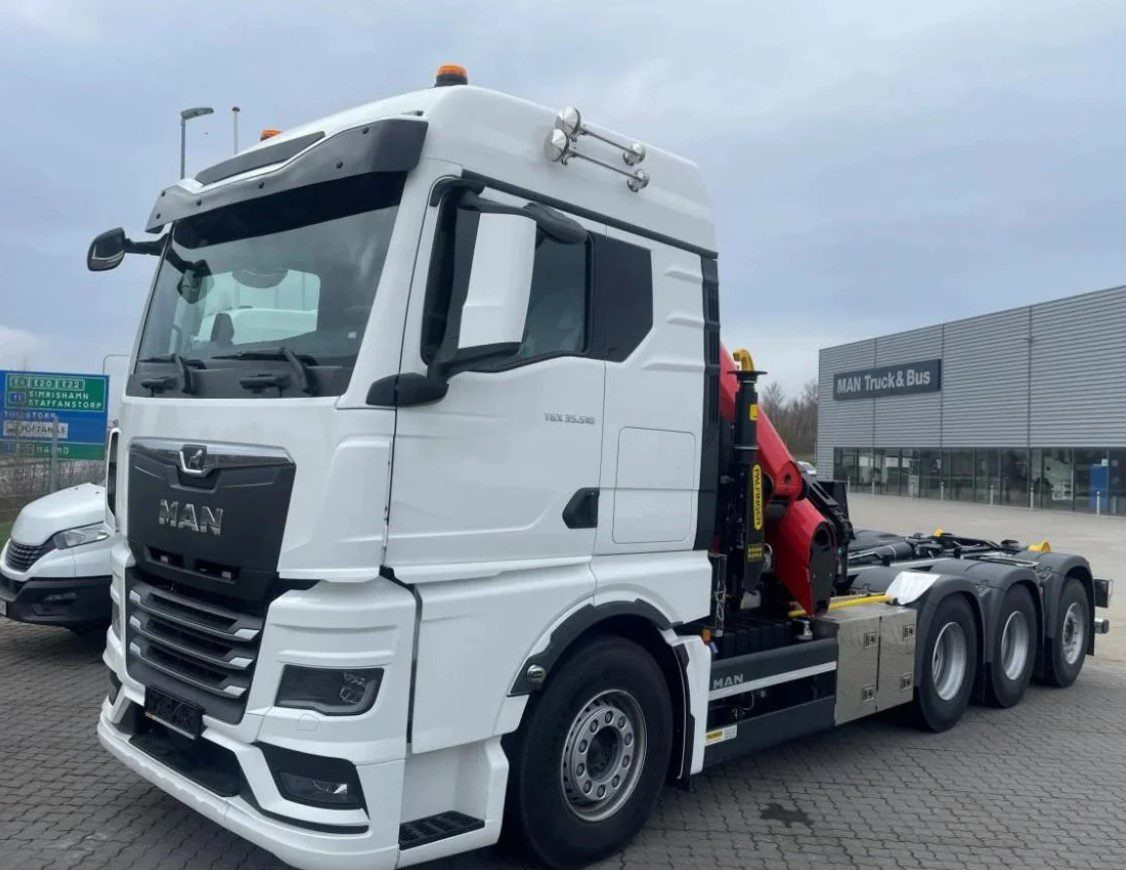 MAN TGS 35.510 8×4 Tridem kranväxlare Palfinger - Haakarmsysteem vrachtwagen, Kraanwagen: afbeelding 1 MAN TGS 35.510 8×4 Tridem kranväxlare Palfinger - Haakarmsysteem vrachtwagen, Kraanwagen: afbeelding 1
