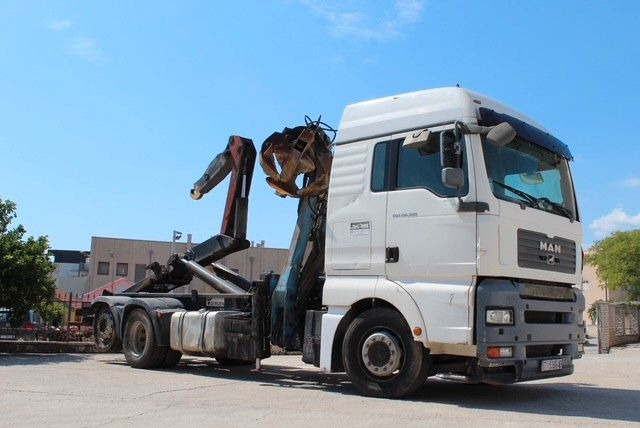 MAN TGA 26.360 FG 6x2 LL GERGEN Abroll + Penz Kran - Haakarmsysteem vrachtwagen, Kraanwagen: afbeelding 1 MAN TGA 26.360 FG 6x2 LL GERGEN Abroll + Penz Kran - Haakarmsysteem vrachtwagen, Kraanwagen: afbeelding 1
