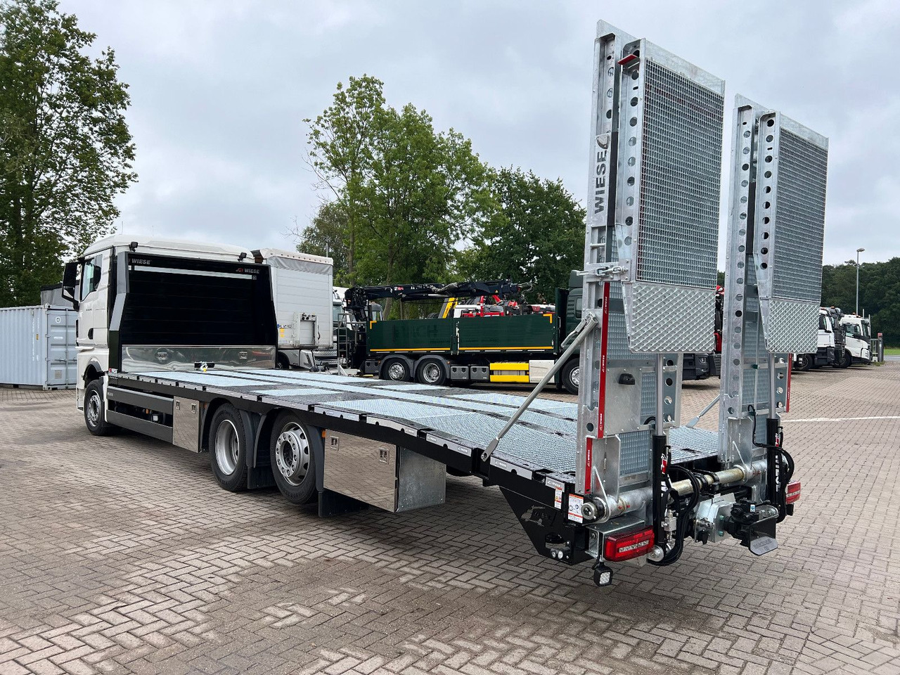 MAN Baumaschinen- Arbeitsbühnentransporter Rampen - Bergingsvoertuig: afbeelding 1 MAN Baumaschinen- Arbeitsbühnentransporter Rampen - Bergingsvoertuig: afbeelding 1