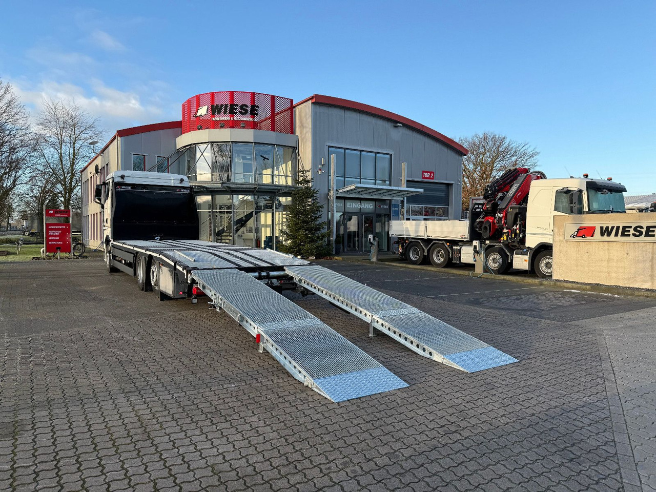 MAN Baumaschinen- Arbeitsbühnentransporter Rampen - Autovrachtwagen vrachtwagen: afbeelding 1 MAN Baumaschinen- Arbeitsbühnentransporter Rampen - Autovrachtwagen vrachtwagen: afbeelding 1