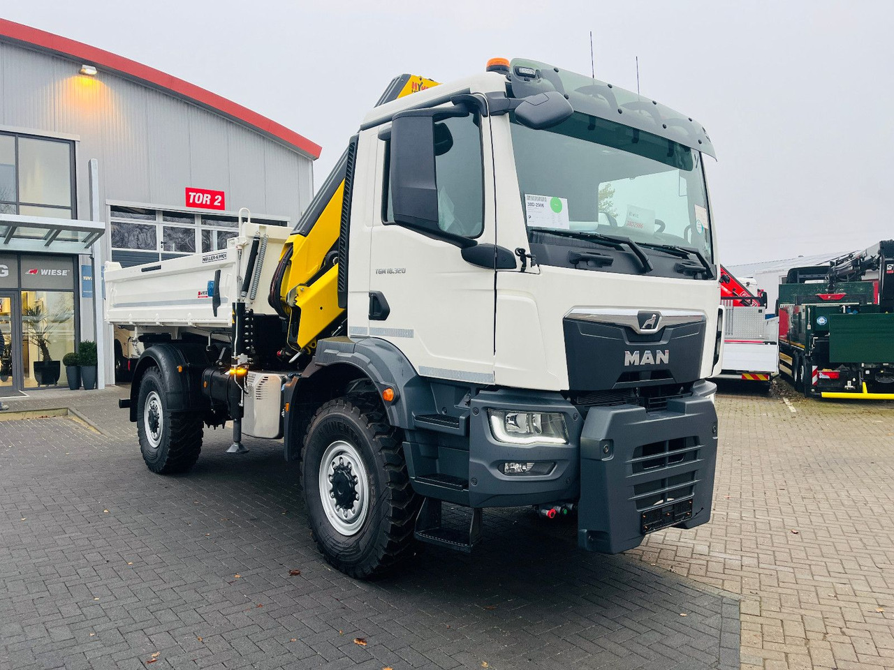 MAN TGM 18.320 4x4 BB Kipper Kran 131 Single Winter - Kipper vrachtwagen, Kraanwagen: afbeelding 2 MAN TGM 18.320 4x4 BB Kipper Kran 131 Single Winter - Kipper vrachtwagen, Kraanwagen: afbeelding 2