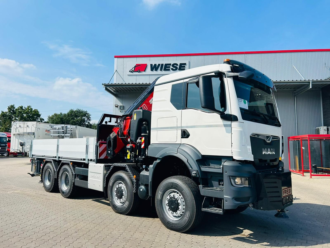 MAN TGS 41.520 8x8 mit Fassi Ladekran F710RA.2.26 - Vrachtwagen met open laadbak: afbeelding 4 MAN TGS 41.520 8x8 mit Fassi Ladekran F710RA.2.26 - Vrachtwagen met open laadbak: afbeelding 4