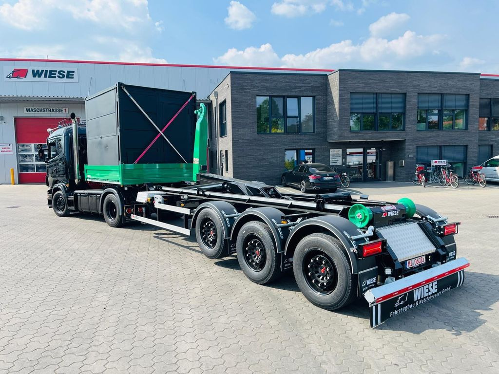 Wiese Hakenliftauflieger Abrollkipper Hooklift - Containertransporter/ Wissellaadbak oplegger: afbeelding 1 Wiese Hakenliftauflieger Abrollkipper Hooklift - Containertransporter/ Wissellaadbak oplegger: afbeelding 1