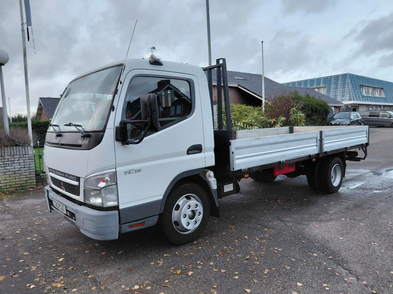 Mitsubishi Canter 7C15 4x2 STEEL SPRING MANUAL GEARBOX - Vrachtwagen met open laadbak: afbeelding 1 Mitsubishi Canter 7C15 4x2 STEEL SPRING MANUAL GEARBOX - Vrachtwagen met open laadbak: afbeelding 1