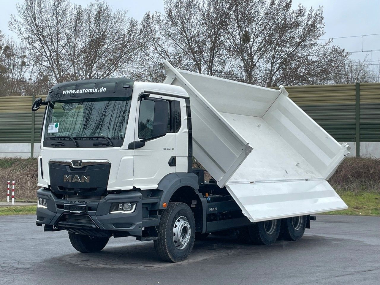 MAN TGS 33.440 6x4 /Euro6 3-Seiten-Kipper EuromixMTP - Kipper vrachtwagen: afbeelding 1 MAN TGS 33.440 6x4 /Euro6 3-Seiten-Kipper EuromixMTP - Kipper vrachtwagen: afbeelding 1