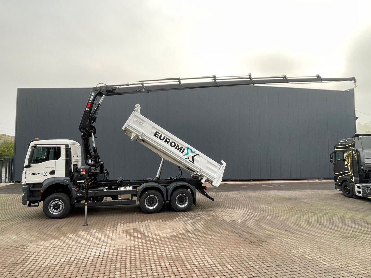 MAN TGS 33.440 6x6 /3-Seiten- Kipper / HIAB 228-6 - Kipper vrachtwagen, Kraanwagen: afbeelding 1 MAN TGS 33.440 6x6 /3-Seiten- Kipper / HIAB 228-6 - Kipper vrachtwagen, Kraanwagen: afbeelding 1