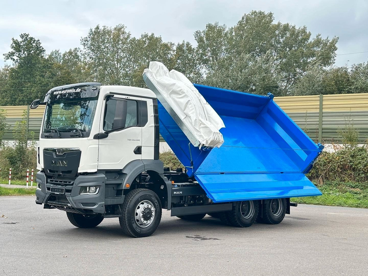 MAN TGS 33.440 6x6 /Euro6 3-Seiten-Kipper EuromixMTP - Kipper vrachtwagen: afbeelding 2 MAN TGS 33.440 6x6 /Euro6 3-Seiten-Kipper EuromixMTP - Kipper vrachtwagen: afbeelding 2