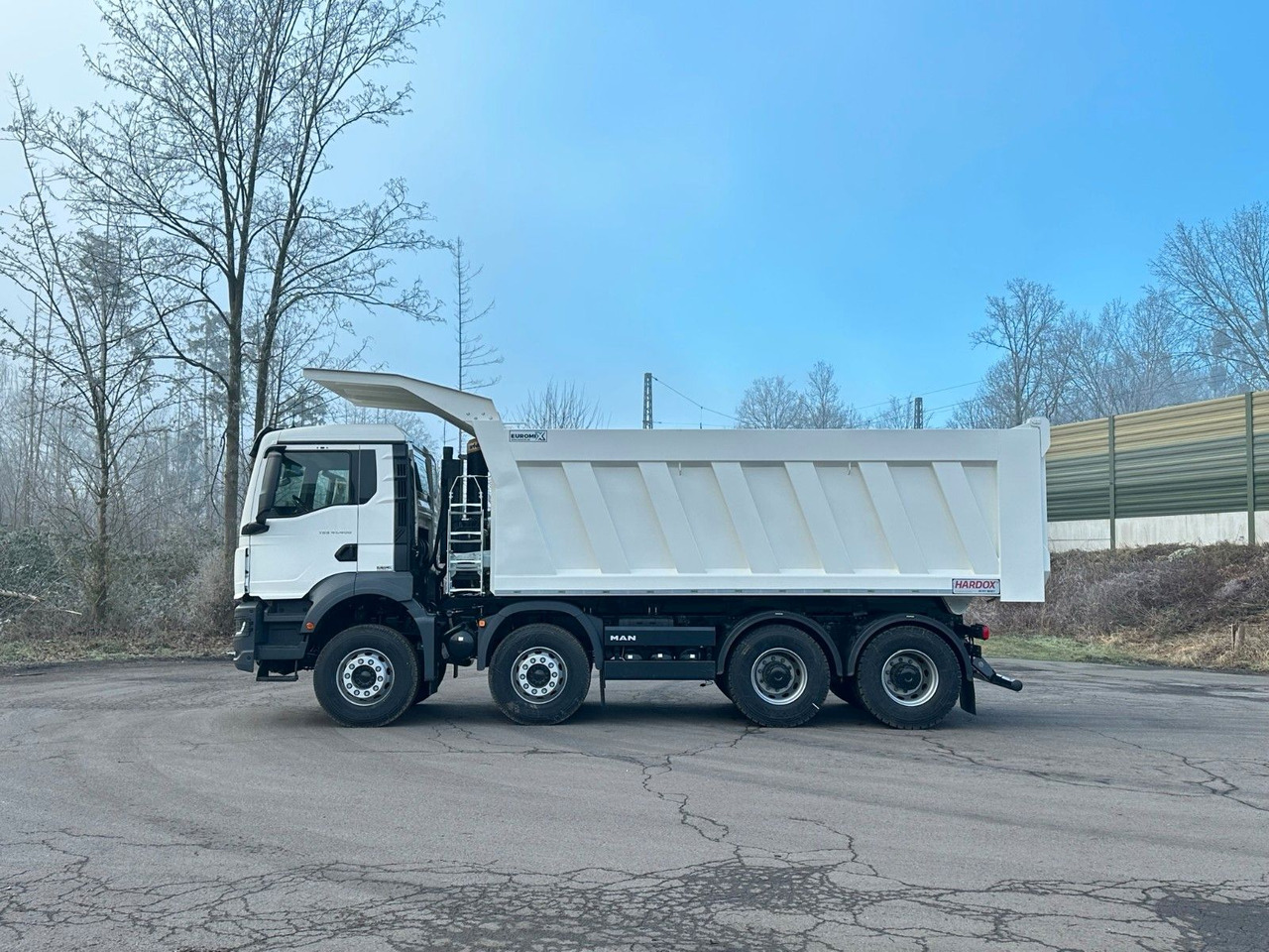 MAN TGS 41.400 8x4 / EUROMIX MTP 23m³/ Eckige Mulde MAN TGS 41.400 8x4 / EUROMIX MTP 23m³/ Eckige Mulde - Kipper vrachtwagen: afbeelding 5 MAN TGS 41.400 8x4 / EUROMIX MTP 23m³/ Eckige Mulde MAN TGS 41.400 8x4 / EUROMIX MTP 23m³/ Eckige Mulde - Kipper vrachtwagen: afbeelding 5