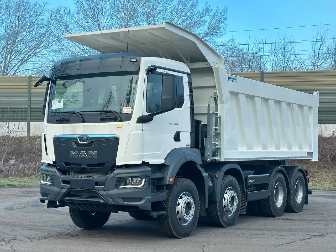 MAN TGS 41.400 8x4 / EUROMIX MTP 23m³/ Eckige Mulde MAN TGS 41.400 8x4 / EUROMIX MTP 23m³/ Eckige Mulde - Kipper vrachtwagen: afbeelding 1 MAN TGS 41.400 8x4 / EUROMIX MTP 23m³/ Eckige Mulde MAN TGS 41.400 8x4 / EUROMIX MTP 23m³/ Eckige Mulde - Kipper vrachtwagen: afbeelding 1