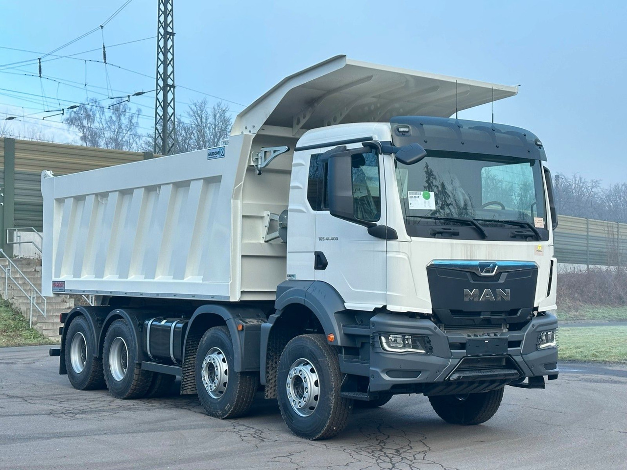 MAN TGS 41.400 8x4 / EUROMIX MTP 23m³/ Eckige Mulde MAN TGS 41.400 8x4 / EUROMIX MTP 23m³/ Eckige Mulde - Kipper vrachtwagen: afbeelding 4 MAN TGS 41.400 8x4 / EUROMIX MTP 23m³/ Eckige Mulde MAN TGS 41.400 8x4 / EUROMIX MTP 23m³/ Eckige Mulde - Kipper vrachtwagen: afbeelding 4