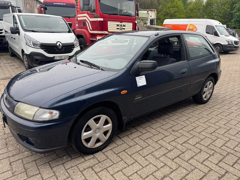 Mazda 323 **PETROL-ESSENCE-BELGIUM CAR** - Sedan: afbeelding 1 Mazda 323 **PETROL-ESSENCE-BELGIUM CAR** - Sedan: afbeelding 1