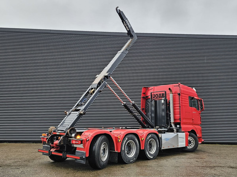 MAN TGX 35.500 / 8x4-4 / HOOKLIFT / ABROLL-KIPPER - Haakarmsysteem vrachtwagen: afbeelding 4 MAN TGX 35.500 / 8x4-4 / HOOKLIFT / ABROLL-KIPPER - Haakarmsysteem vrachtwagen: afbeelding 4