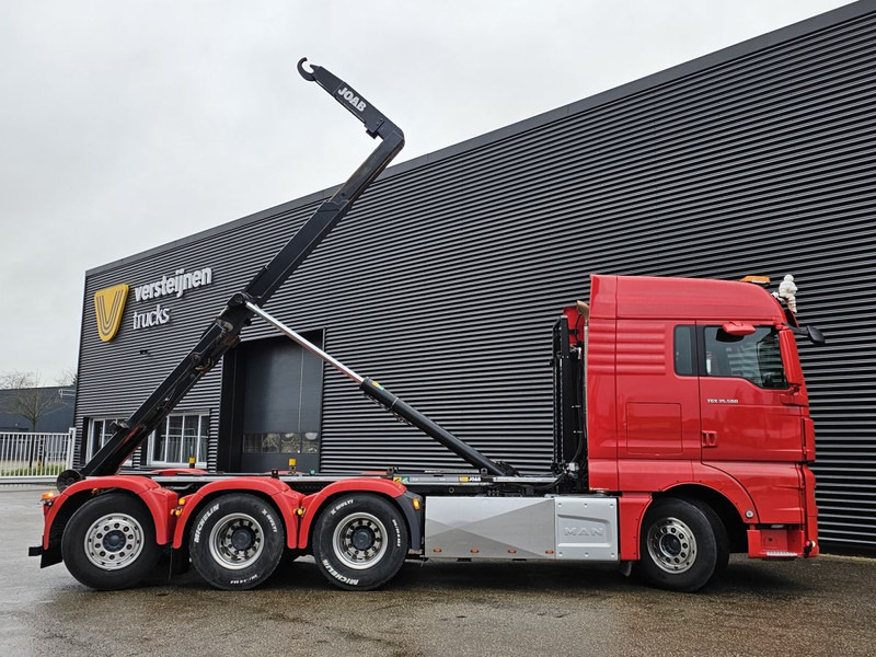 MAN TGX 35.500 / 8x4-4 / HOOKLIFT / ABROLL-KIPPER - Haakarmsysteem vrachtwagen: afbeelding 5 MAN TGX 35.500 / 8x4-4 / HOOKLIFT / ABROLL-KIPPER - Haakarmsysteem vrachtwagen: afbeelding 5