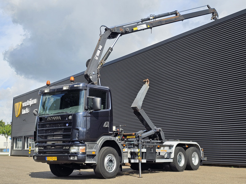 Scania R114.340 6x2 / HIAB CRANE + 25T HOOKLIFT - Haakarmsysteem vrachtwagen, Kraanwagen: afbeelding 1 Scania R114.340 6x2 / HIAB CRANE + 25T HOOKLIFT - Haakarmsysteem vrachtwagen, Kraanwagen: afbeelding 1