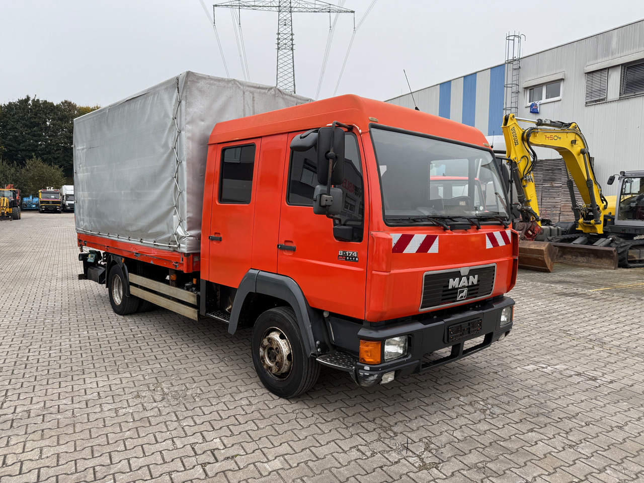 MAN 8.174 Pritsche+Plane+Ladebordwand DOKA L2000 - Schuifzeilen vrachtwagen: afbeelding 3 MAN 8.174 Pritsche+Plane+Ladebordwand DOKA L2000 - Schuifzeilen vrachtwagen: afbeelding 3