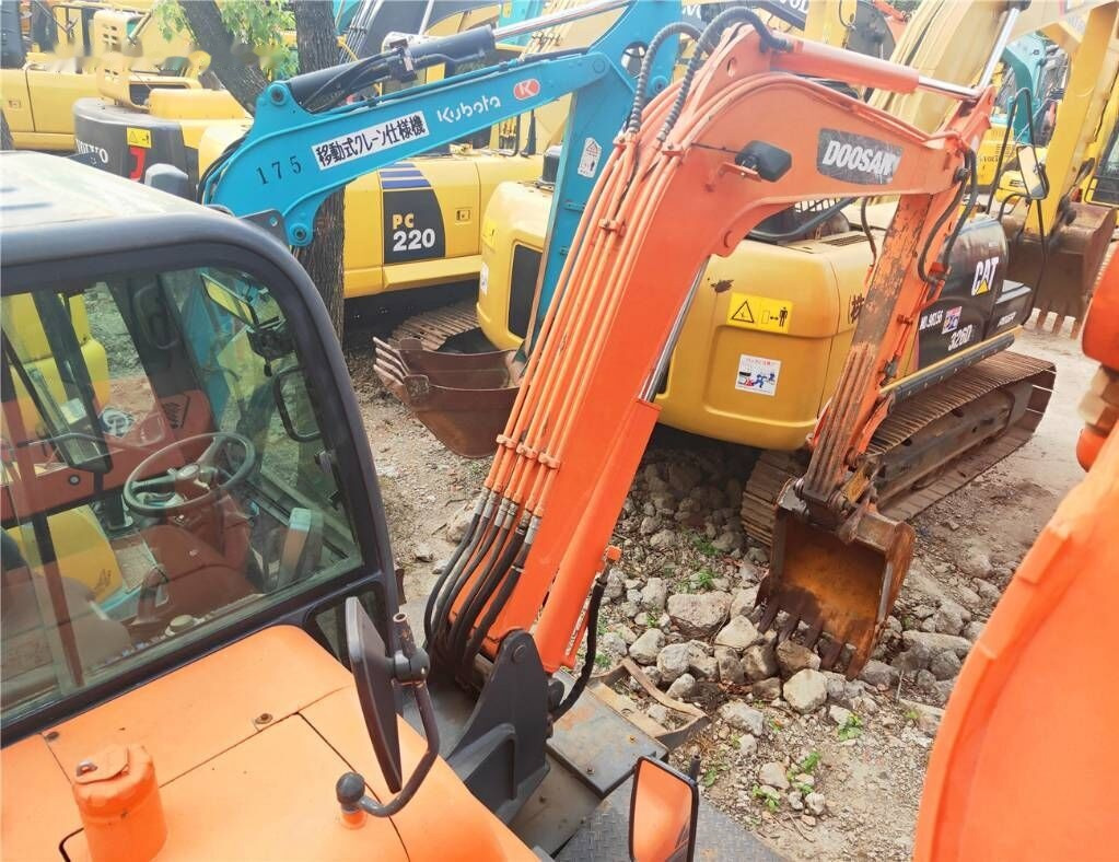 Doosan DX60 W - Mobiele graafmachine: afbeelding 3 Doosan DX60 W - Mobiele graafmachine: afbeelding 3